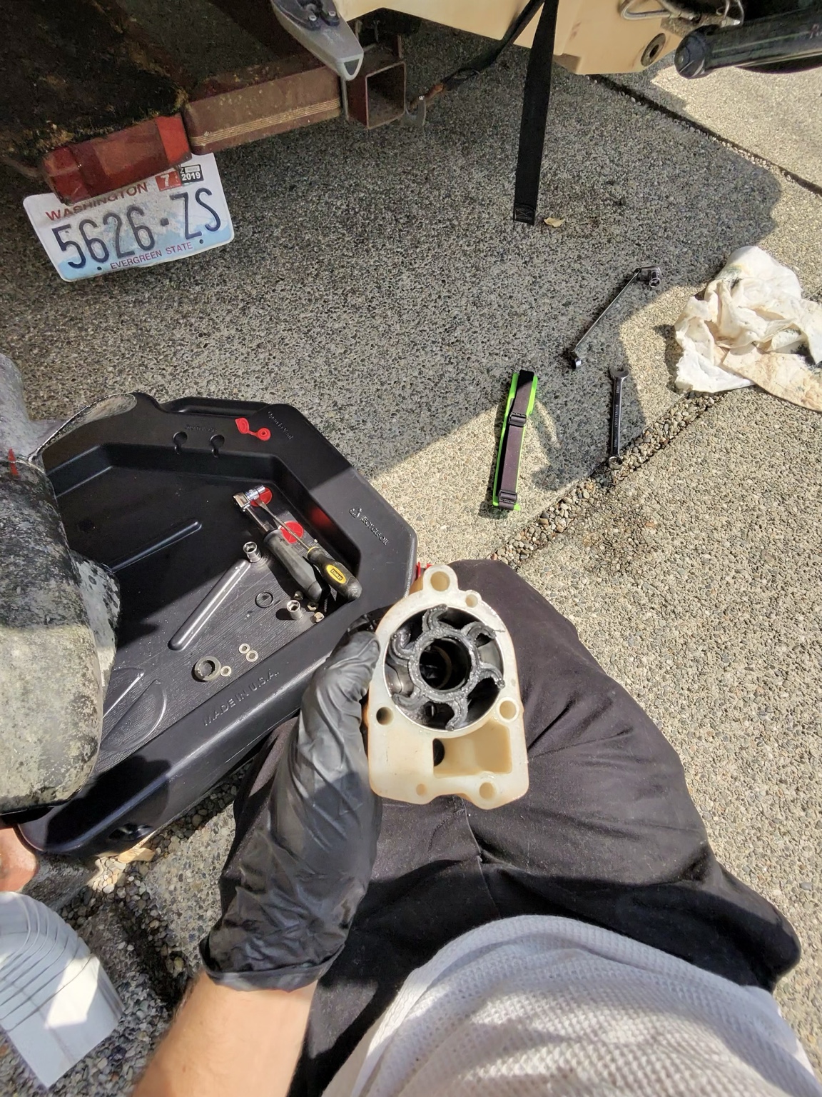 Damaged marine pump being inspected during repair